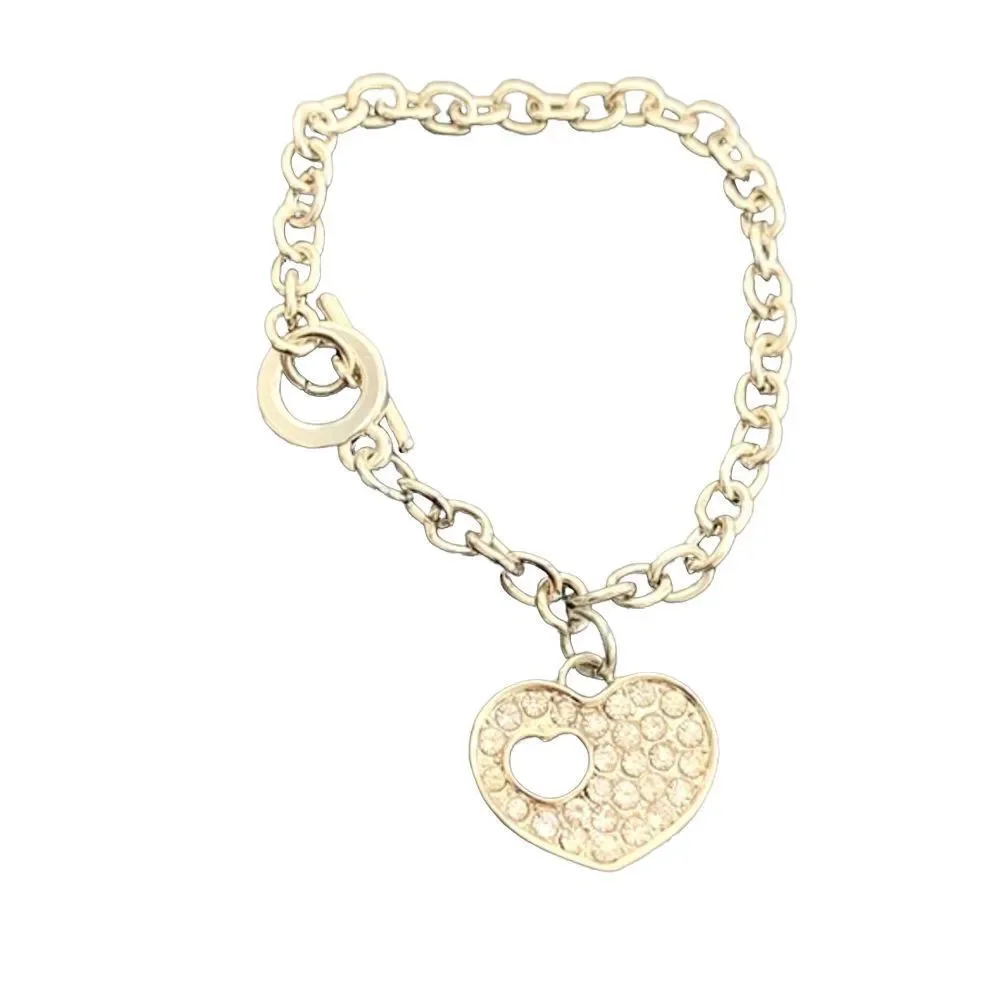 Heart Charm Bracelet with Swarovski Crystals in Silver Tone Rhodium Plate